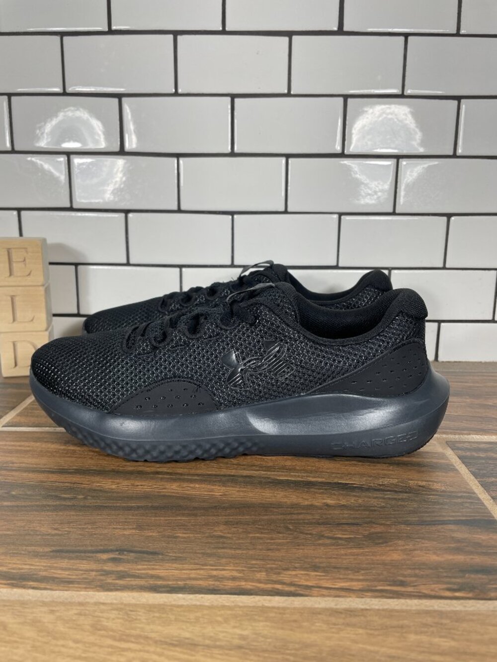 Under Armour Charged Surge 4 Running Shoes Womens Size 8 Black Trainers Sneakers